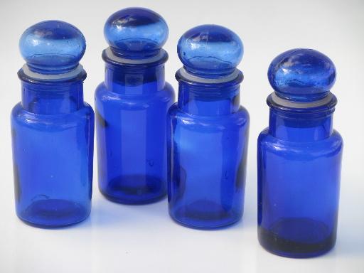 photo of vintage cobalt blue glass apothecary bottles or spice jars set #1