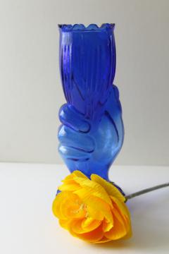 catalog photo of vintage cobalt blue glass vase, lady's hand holding trumpet shaped flower