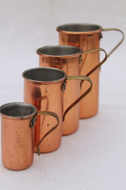 photo of vintage copper measuring cups, set graduated measures or bar jiggers 1/4 to 1 cup size #1