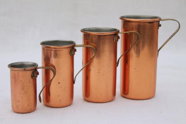 photo of vintage copper measuring cups, set graduated measures or bar jiggers 1/4 to 1 cup size #2