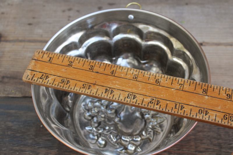 photo of vintage copper mold, tall fluted round mold w/ fruit pattern #5