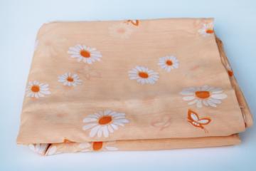 catalog photo of vintage cotton blend fabric w/ flocked flowers, big daisies on sherbet orange