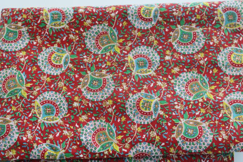 photo of vintage cotton fabric, paisley style vines & flowers print, green, yellow, gold on red #1