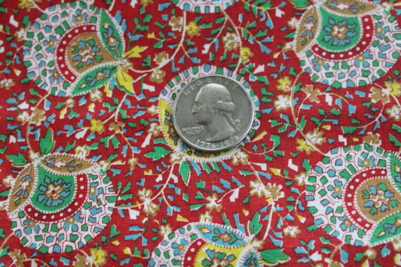 photo of vintage cotton fabric, paisley style vines & flowers print, green, yellow, gold on red #2