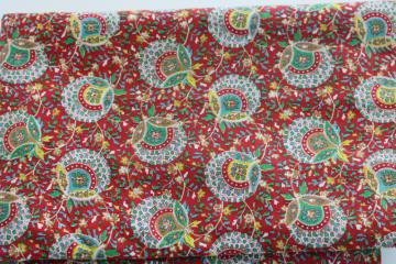 catalog photo of vintage cotton fabric, paisley style vines & flowers print, green, yellow, gold on red