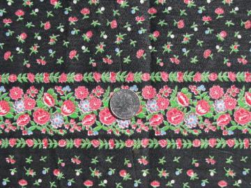 catalog photo of vintage cotton fabric, pink roses on black, border print