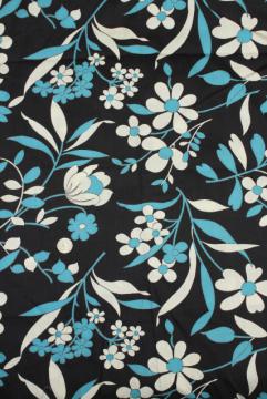 catalog photo of vintage cotton fabric w/ retro flowers print aqua & white on blue black