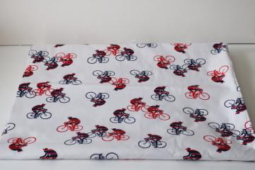 catalog photo of vintage cotton fabric w/ Euro mod style bicycle racers red & blue print on white 