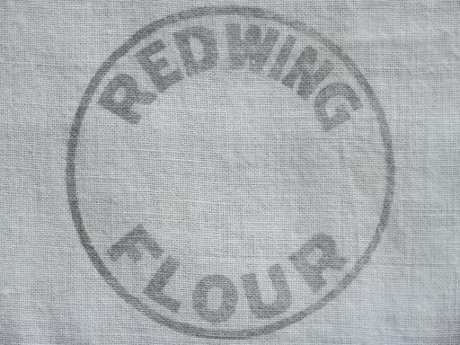 photo of vintage cotton feedsack fabric, primitive flour sack w/ old Red Wing logo #2