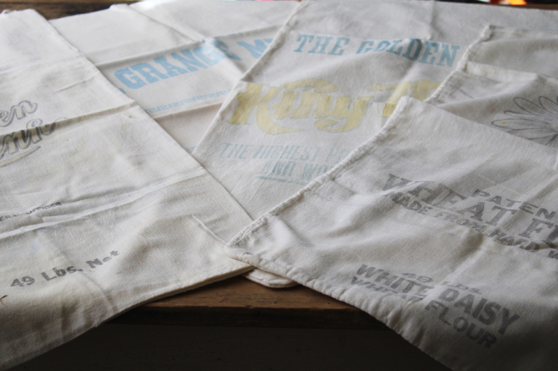 photo of vintage cotton flour sacks w/ faded advertising graphics King Midas, Golden Link, White Daisy #1