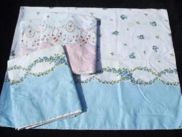 catalog photo of vintage cotton pillowcases, 1950s floral border print fabric, pink and blue