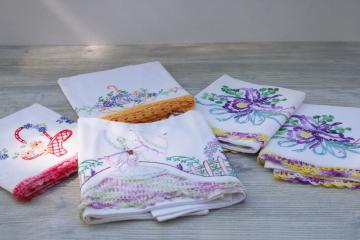 catalog photo of vintage cotton pillowcases w/ fancywork embroidery crochet lace edging, most singles