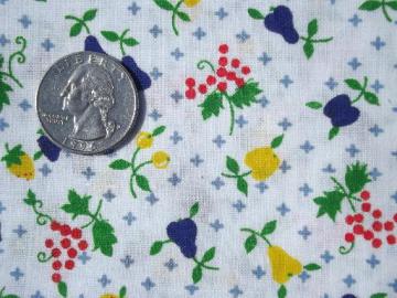 catalog photo of vintage cotton print fabric, tiny fruit print in red, blue, yellow 