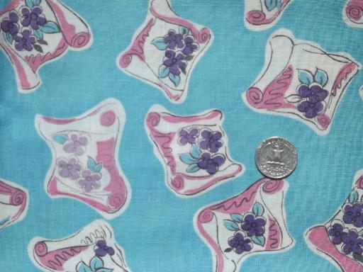 photo of vintage cotton print feed sack fabric, scrolls of violets on turquoise #1