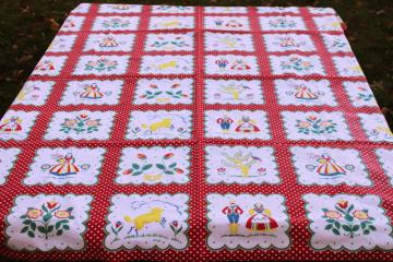 catalog photo of vintage cotton tablecloth, Pennsylvania Dutch folk art print blocks w/ red polka dotted border 