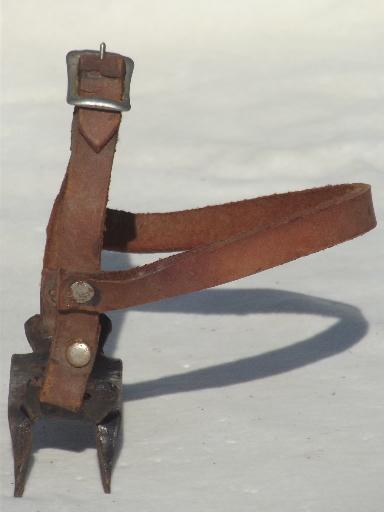 photo of vintage crampons, old steel boot cleats for walking on ice and snow #2