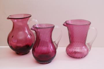 catalog photo of vintage cranberry glass, hand blown Pilgrim glass mini pitchers collection