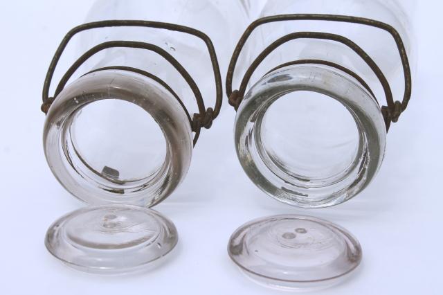 photo of vintage cream or milk bottles, old half-pint bottle w/ wire bail glass lids #6