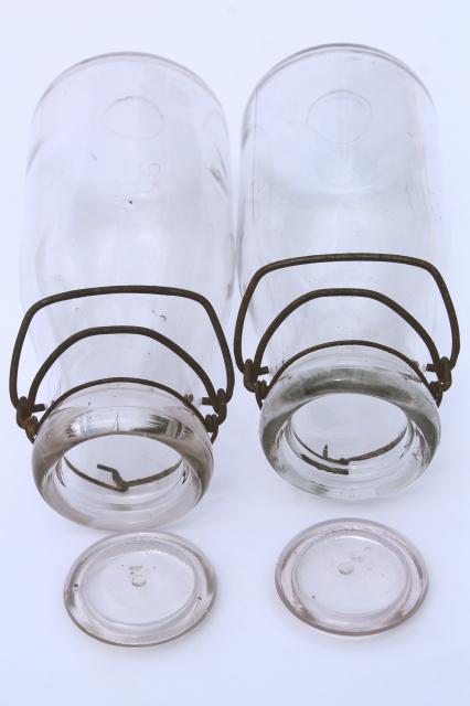 photo of vintage cream or milk bottles, old half-pint bottle w/ wire bail glass lids #7