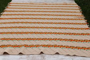 catalog photo of vintage crochet afghan, fringed Indian blanket hippie style, southwest orange, gold, turquoise on tan 