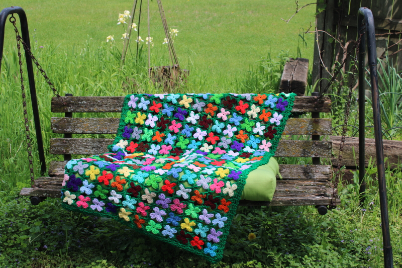 photo of vintage crochet afghan, lap blanket throw or shawl, bright boho flowers on green, crocheted granny squares #1