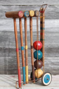 catalog photo of vintage croquet set, old wood croquet balls & mallets w/ wire caddy cart