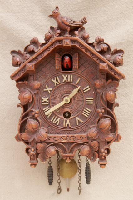 photo of vintage cuckoo clock Lux / Waterbury wind-up clock black forest fairy tale cottage #1