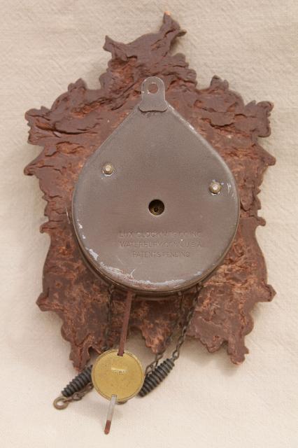 photo of vintage cuckoo clock Lux / Waterbury wind-up clock black forest fairy tale cottage #2