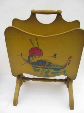 catalog photo of vintage deco moderne magazine rack, chinese junk airbrush stencil, red & black on gold