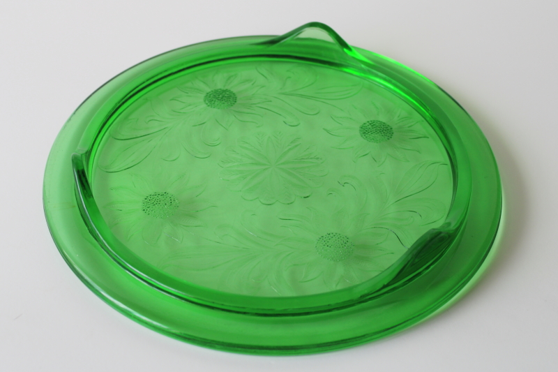 photo of vintage depression glass cake plate, Jeannette sunflower pattern deep green glass with uranium glow  #3