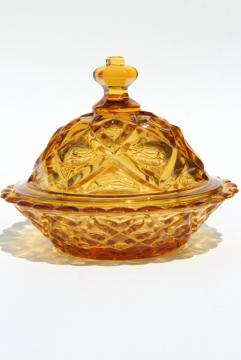 catalog photo of vintage diamond thumbprint pattern amber glass round covered butter dish