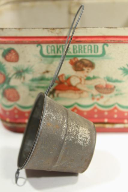 photo of vintage doll sized kitchenware, metal cookie cutters & cake pans, old painted bread tin #6