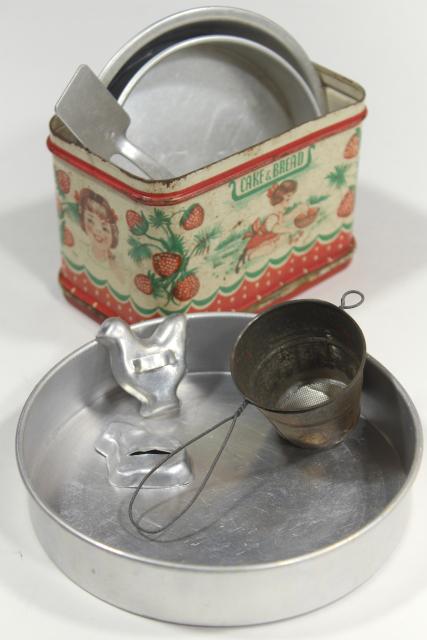 photo of vintage doll sized kitchenware, metal cookie cutters & cake pans, old painted bread tin #9