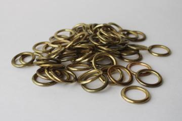 catalog photo of vintage drapery hardware, lot of 64 brass curtain rings for rod hanging cottagecore cafe curtains 