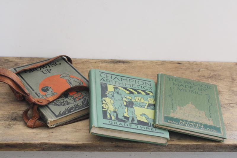 photo of vintage early reader school books w/ green covers in old antique leather strap satchel #10