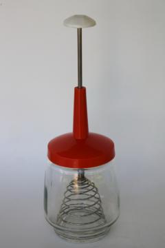 catalog photo of vintage egg beater jar, spring type whisk or whip w/ push down plunger handle