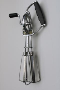 catalog photo of vintage egg beater, stainless steel rotary hand crank mixer kitchen tool 