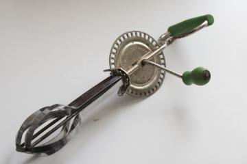 catalog photo of vintage eggbeater, hand crank rotary mixer w/ old green paint wood handle