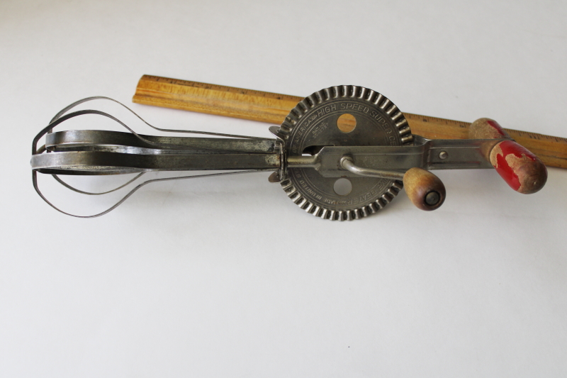 photo of vintage eggbeater, hand crank rotary mixer w/ old red paint wood handle #3