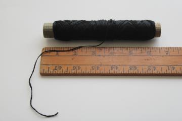 photo of vintage embroidery floss, large spool black silky rayon imitation silk thread