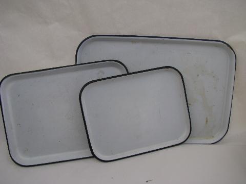 photo of vintage enamelware trays in three different sizes, white w/ black #2