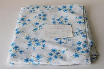catalog photo of vintage fabric, blue floral tiny print on white, soft light sheer crinkle cotton fabric 