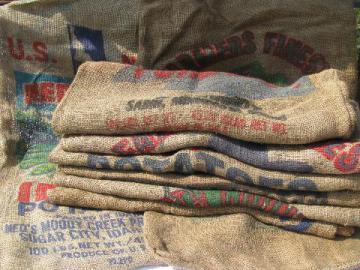 catalog photo of vintage farm primitive burlap potato bags w/ bright advertising graphics, 8 different sacks lot #2