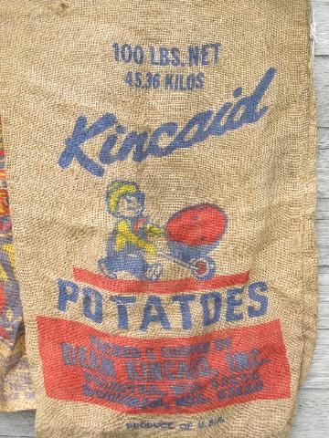 photo of vintage farm primitive burlap potato bags w/ bright advertising graphics #2