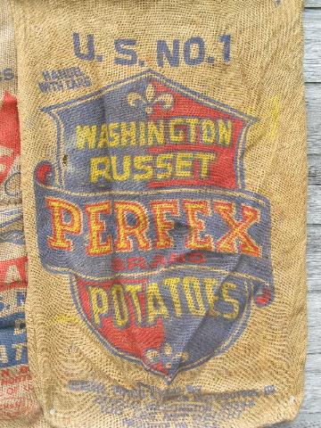 photo of vintage farm primitive burlap potato bags w/ bright advertising graphics #3