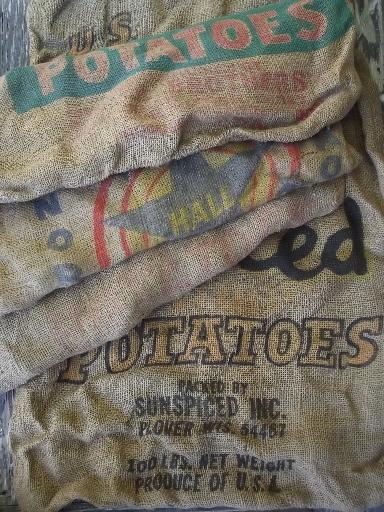 photo of vintage farm primitive burlap potato bags w/ bright advertising graphics #1