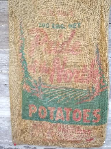 photo of vintage farm primitive burlap potato bags w/ bright advertising graphics #2