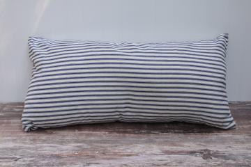 catalog photo of vintage farmhouse indigo blue striped cotton ticking fabric cushion w/ very firm feather pillow insert