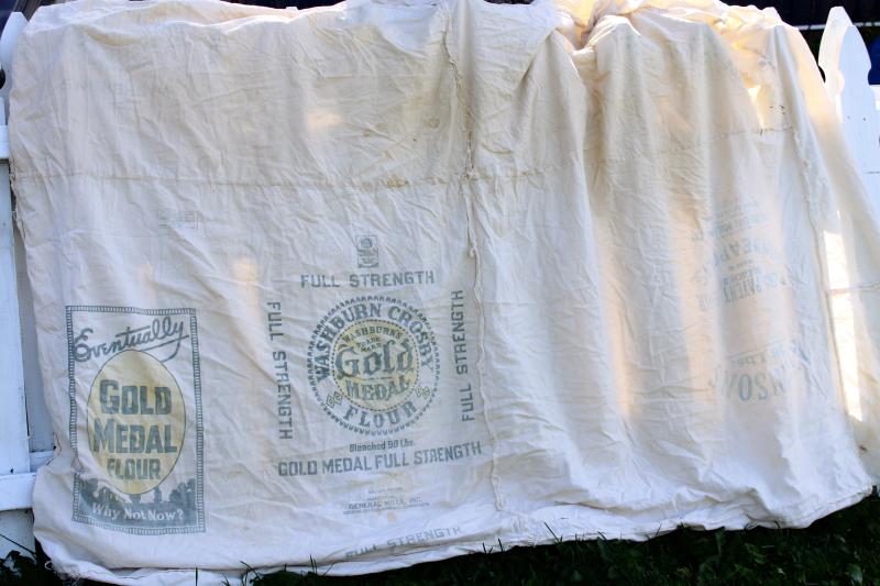 photo of vintage farmhouse primitive cotton flour sack bed cover w/ old advertising printed sacks #1