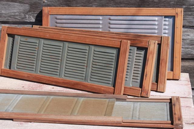 photo of vintage farmhouse window screens w/ slide adjustable wood frames, old galvanized zinc metal vents #1